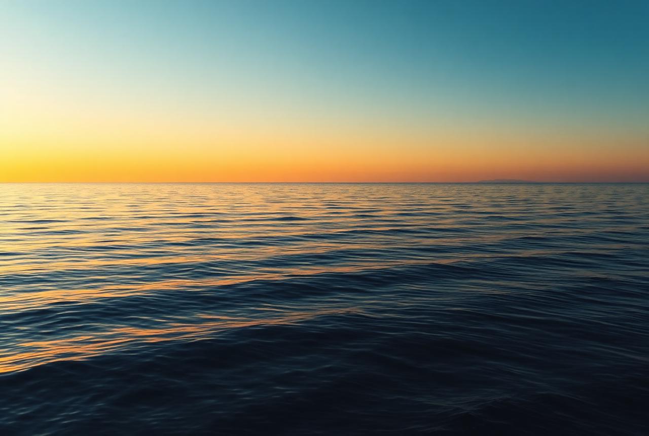 Calm sea horizon at golden hour